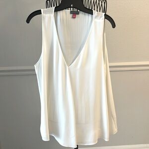 Clean and smooth - fully lined front blouse - to me this is an off- white color